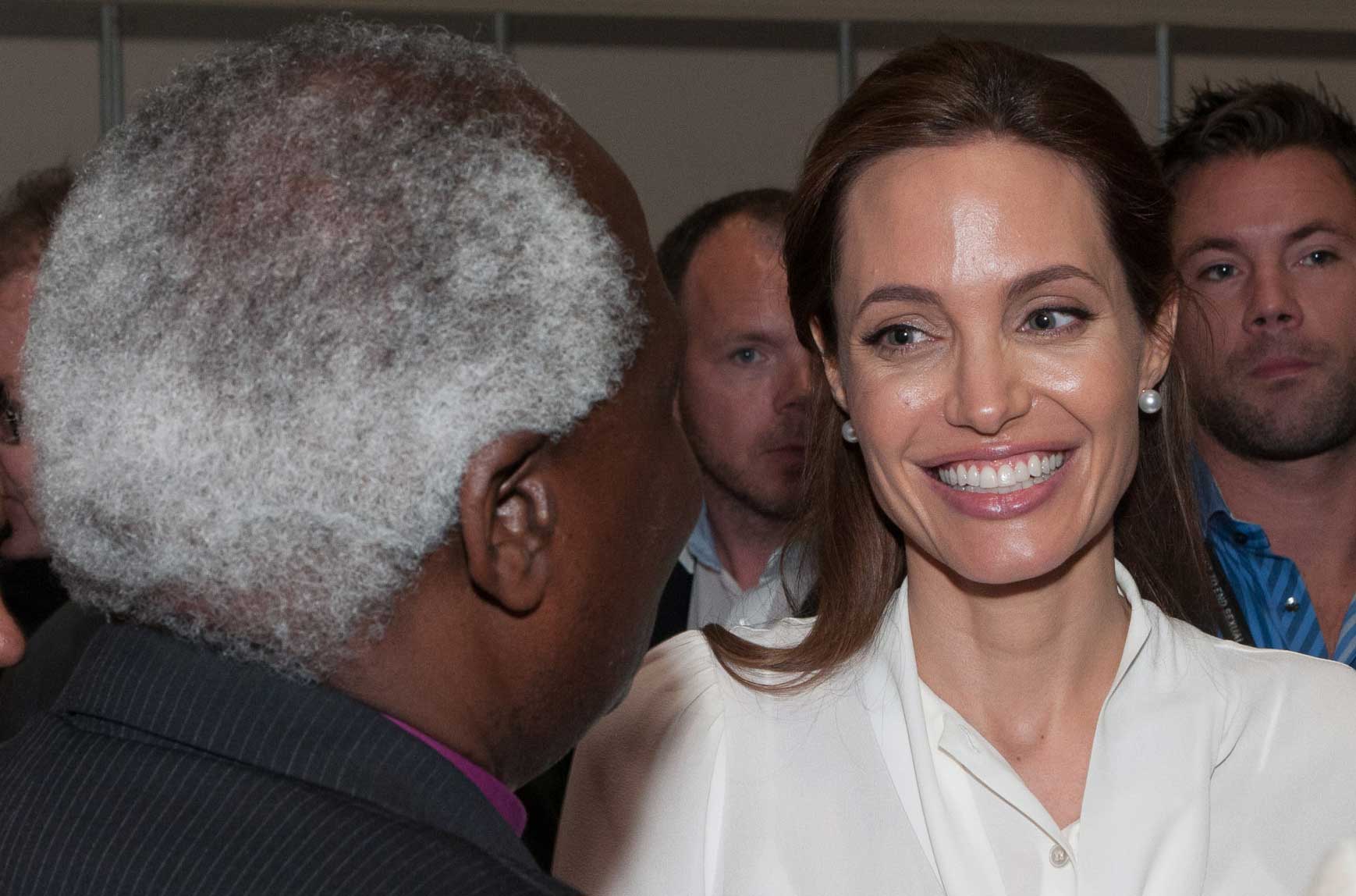 Angelina Jolie greets Archbishop Rwaje