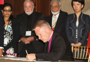 Archbishop Emeritus Dr Anders Wejryd from the Church of Sweden signs interfaith statement